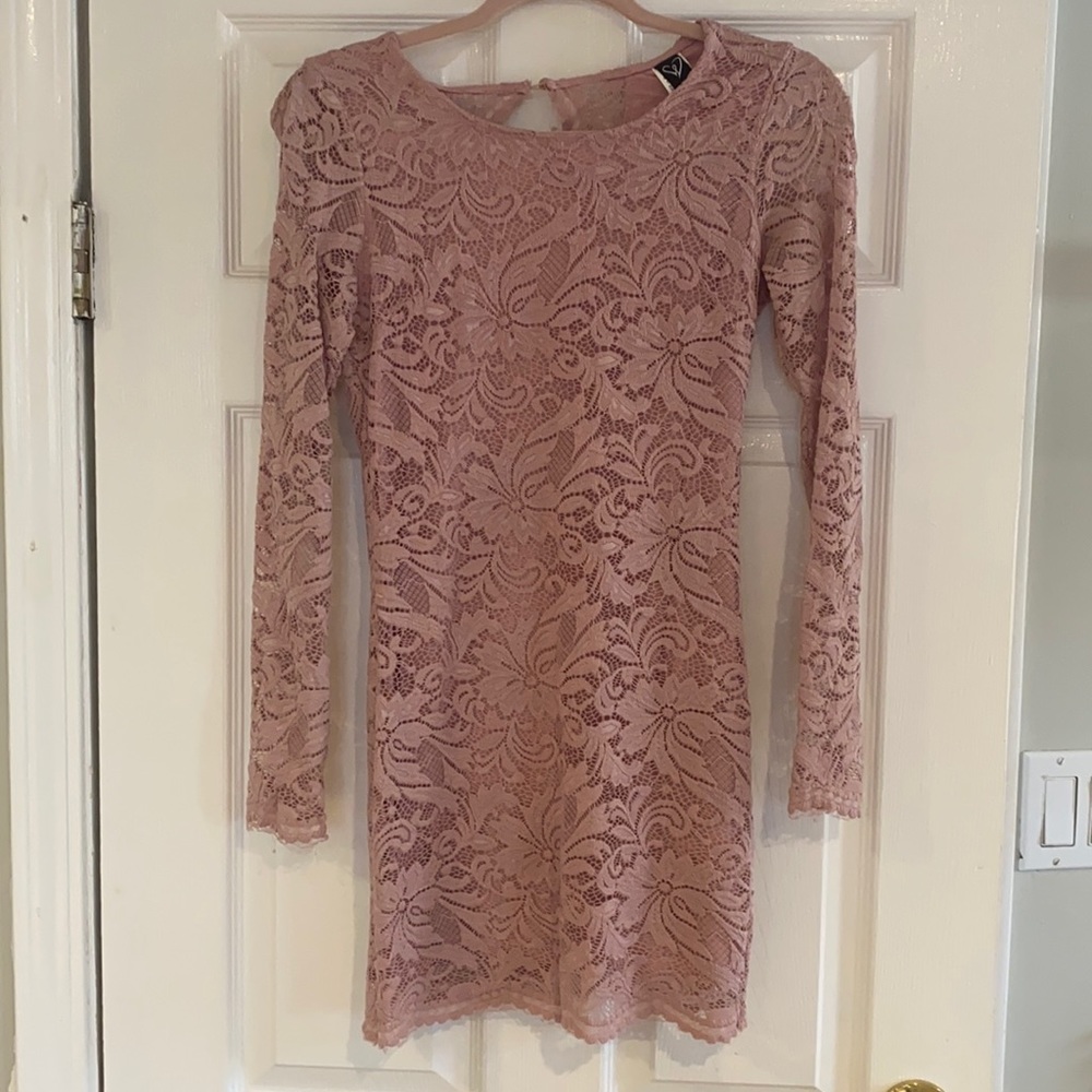 Mauve lace dress with back details. Worn once.